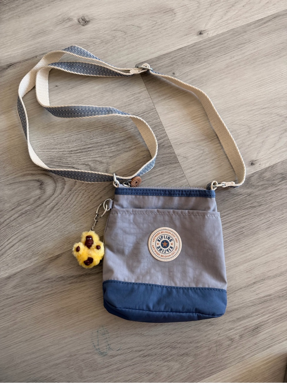 Kipling Gray & Blue Mini Crossbody with Yellow Monkey Charm